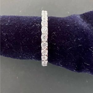 Simulated diamond, sterling silver eternity band.